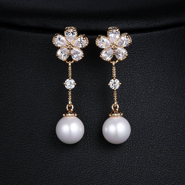 White zirconium light champagne gold