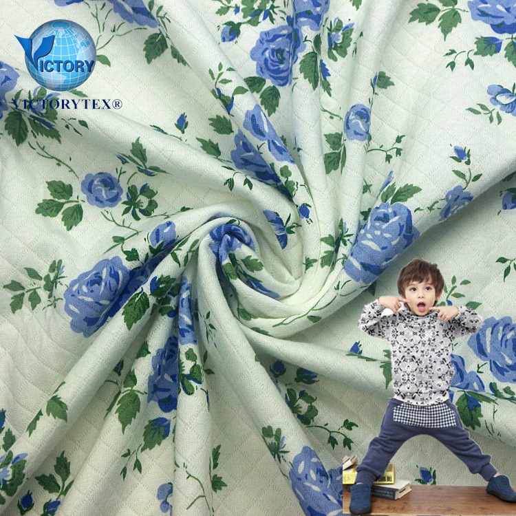 涂料印花空气层针织纬编提花小菱形夹丝布白底印花空气层服装面料