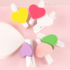 Creative wooden heart-shaped mini clip photo holder sticky note clip pink peach heart small clip white background