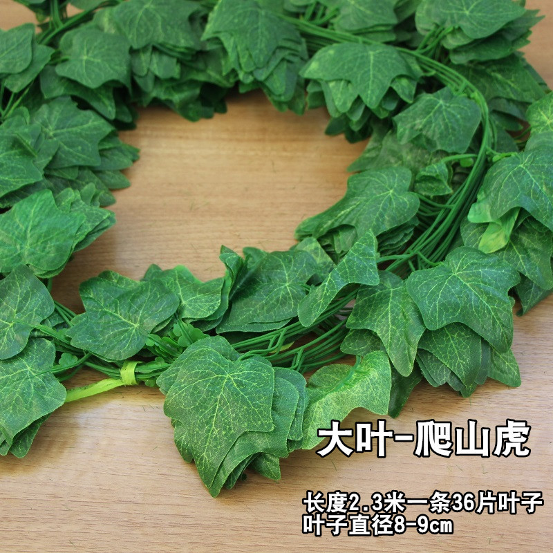 Venta al por mayor de simulación de hoja de uva escalada Tigre ratán Gecko hoja de simulación de plástico planta verde rábano hoja falsa flor decorativa vid