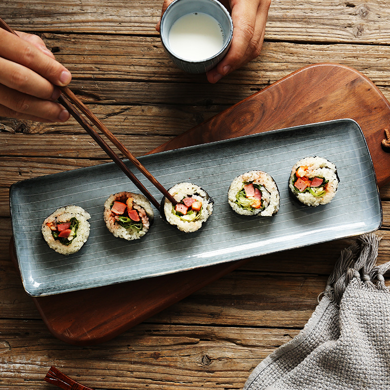 Creativo de forma especial a rayas de cerámica personalizada vajilla hotel restaurante cafetería ensalada de frutas plato fabricante