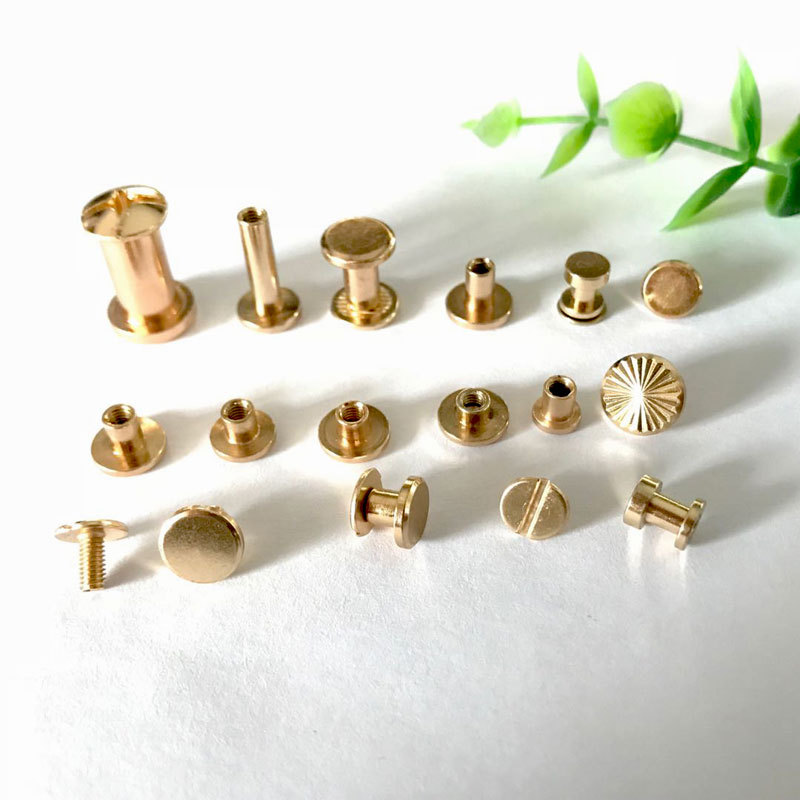 Clavo del libro de cuentas, cerradura de par de niño y madre dorado, tornillo de una palabra, álbum de fotos, calendario de escritorio, receta, par de remaches de niño y madre, tachuelas de cuero