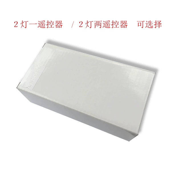 Two lights, two remote control white boxes