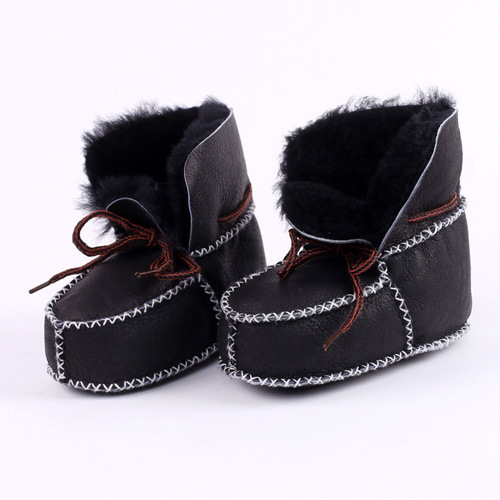 Fábrica al por mayor Niño Zapatos de invierno cálido suave inferior bebé Niño Zapatos Bebé botas pequeñas costura artificial