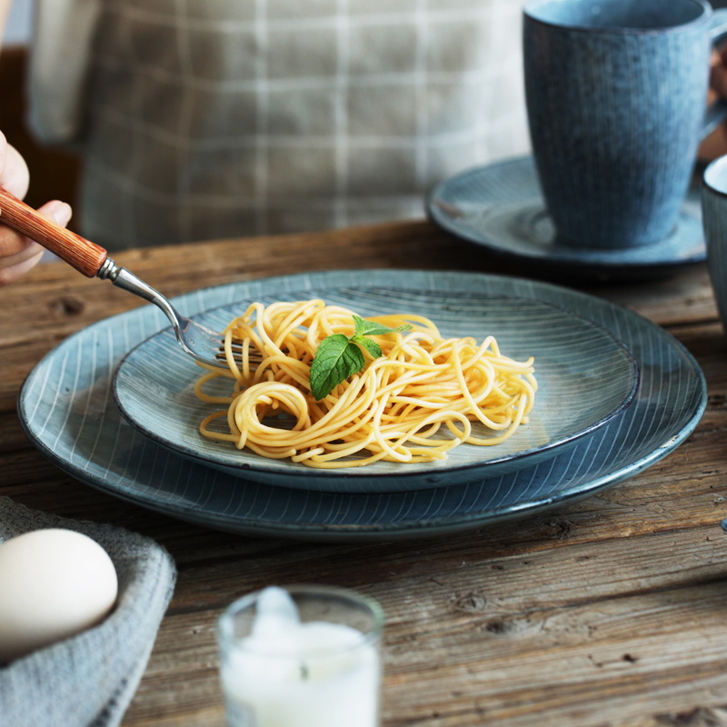 Creativo de forma especial a rayas de cerámica personalizada vajilla hotel restaurante cafetería ensalada de frutas plato fabricante