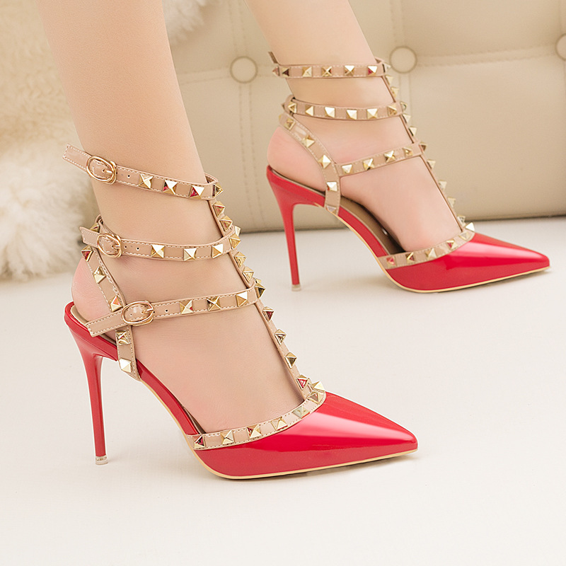 9616-26 European and American-style sexy nightclub stiletto heels patent leather metal rivet hollow Roman fashion sandals
