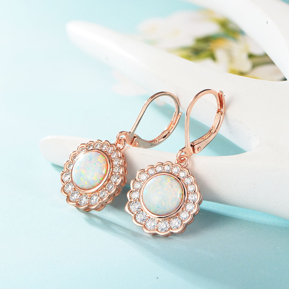 Europa y América transfronteriza pendientes de Venta caliente Opal chapado en oro Opal Zircon pendientes de las mujeres elegantes pendientes de ventas directas de fábrica
