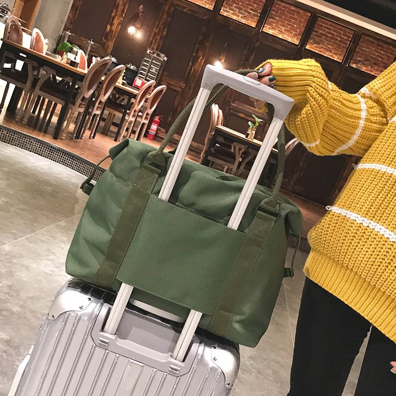 Suministro transfronterizo nuevo bolso de hombro de lona de gran capacidad bolsa de viaje de corta distancia bolso bolsa de equipaje Comercio exterior al por mayor