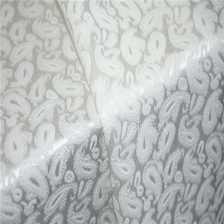全涤梭织小腰果提花亮光无弹现货女装童装服饰手袋旗袍面料现货