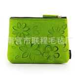 供应新款毛毡包 镂空花型设计时尚手拎毛毡包 质量保证