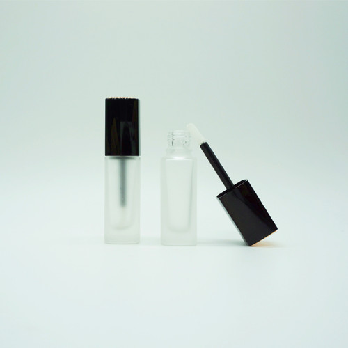 Wholesale empty lip glaze tube, empty glass tube with spray gold top and black cover, lip gloss bottle lip glaze tube