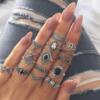 Cross -border jewelry 15 -piece rings Personalized tide Fan Hollow Lotus Flower Geometric Black Gem Set Ring