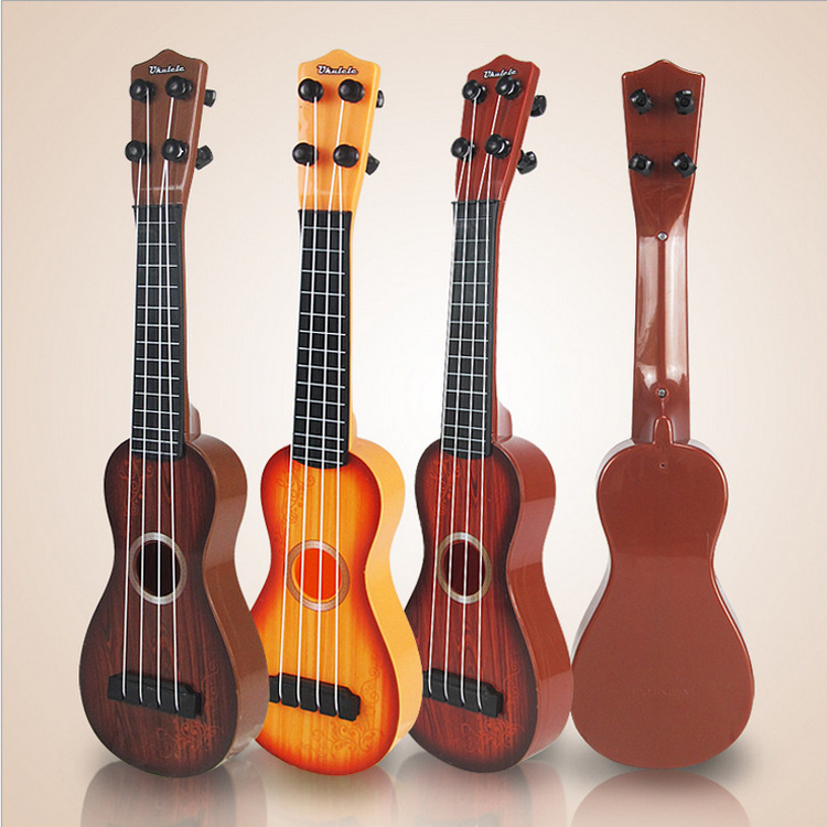 T Ukelele rompecabezas educación temprana instrumentos musicales para niños mini cuatro juguetes de guitarra Hyun