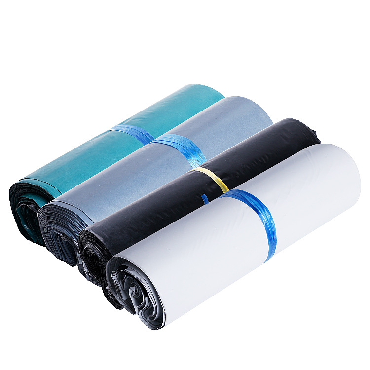 Bolsa de mensajería engrosada color material nuevo ropa logística impermeable autoadhesiva bolsa de embalaje expreso pequeña bolsa de embalaje de comercio electrónico