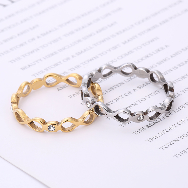 Fabricante de fuente transfronteriza joyería de acero inoxidable corte por láser 8-palabra infinito anillo de acero de titanio de acero inoxidable incrustado en diamante al por mayor