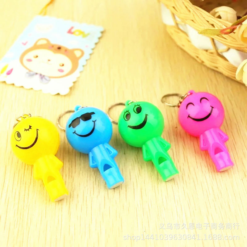 Lindo Smiley cara villano silbato luz de color LED llavero luz colgante luminoso juguete pequeño regalo actividad