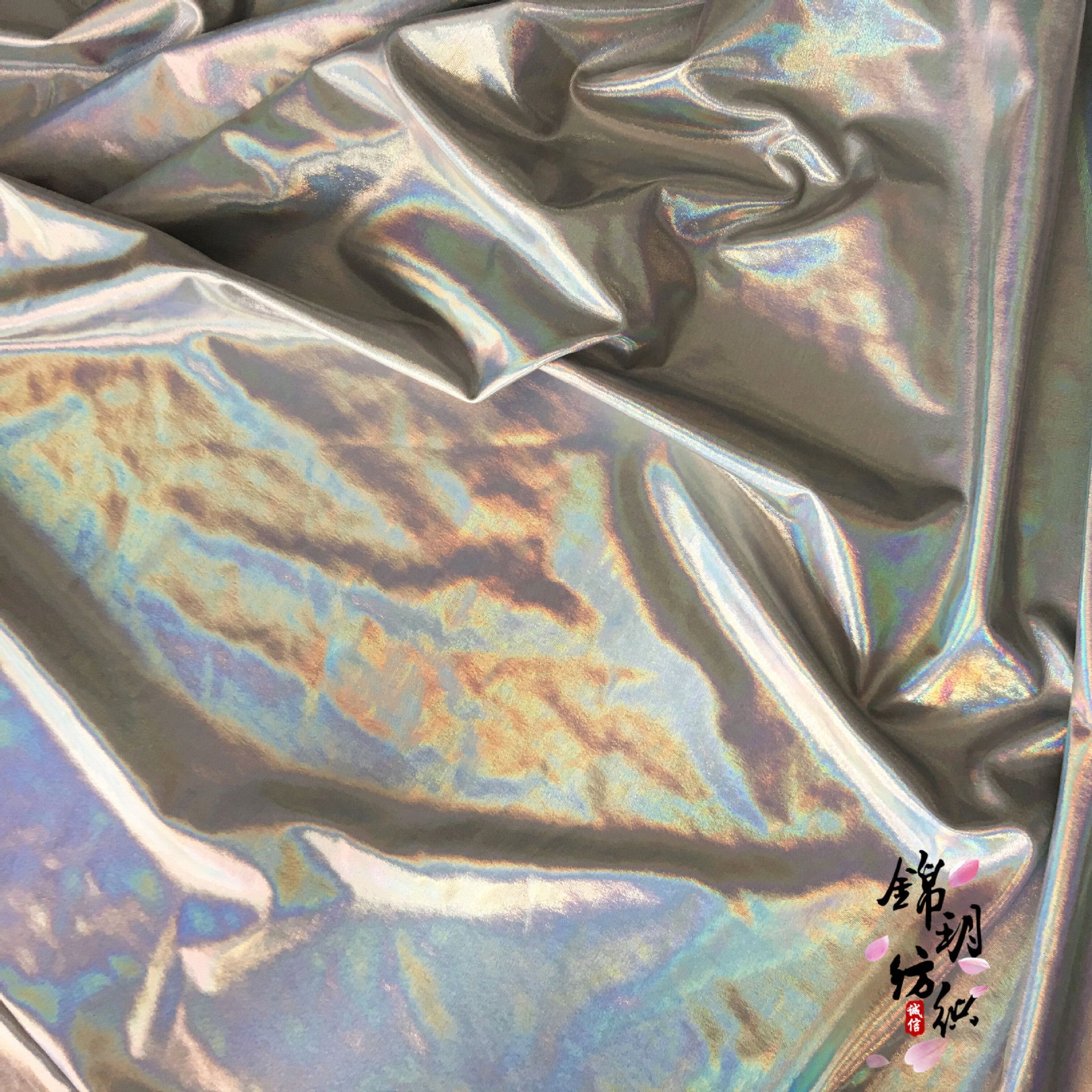 弹力镭射烫金布料七彩色幻彩镭射面料舞台演出服装拍摄道具布批发