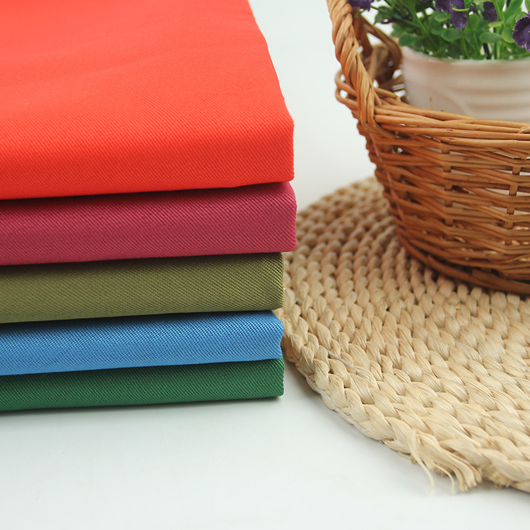 厂家直供410g单面斜纹全涤染色华达呢涂层布拖把面料成品批发