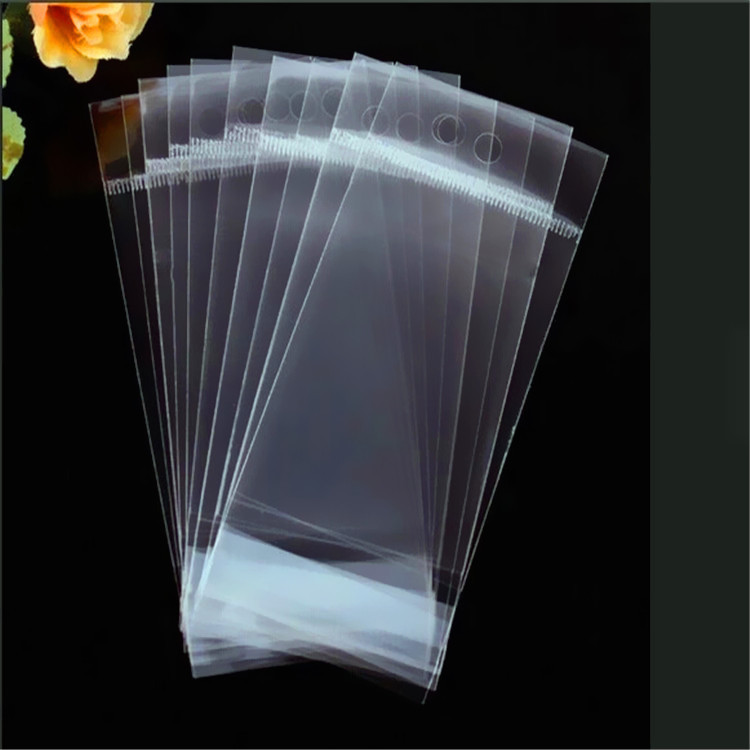 opp印刷自粘冲孔袋自粘袋粉红色卡头自粘袋opp卡头袋不干胶袋厂家