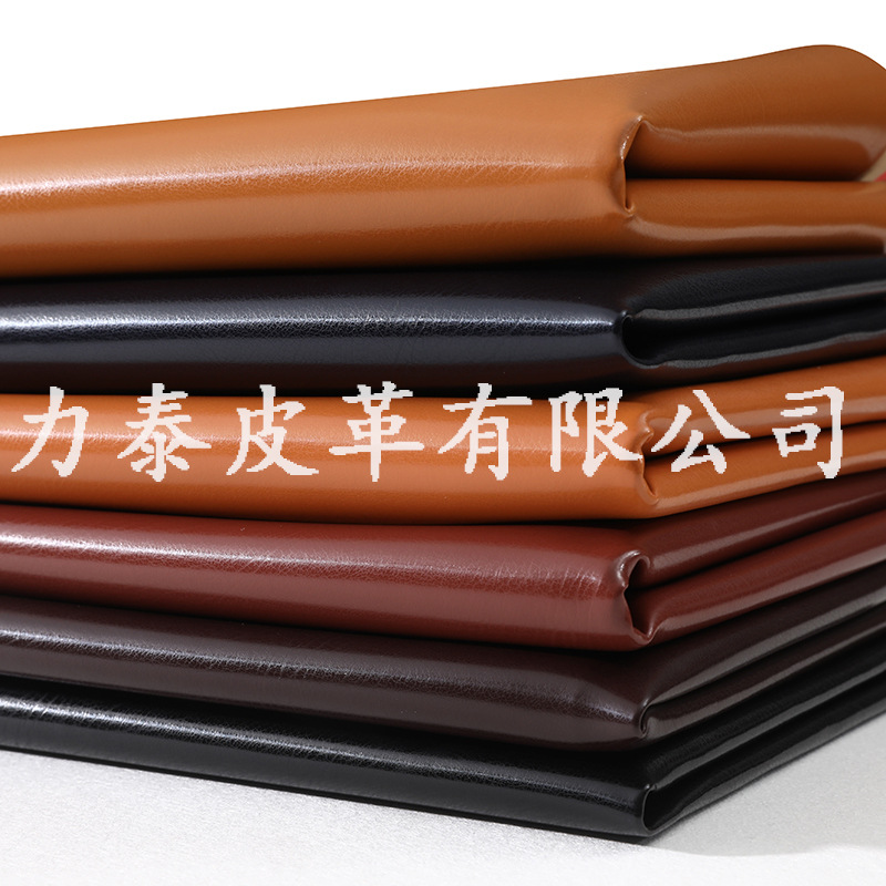 力泰皮革厂家批发pu合成革 男士贝涂底箱包人造革 1.0MM皮带革
