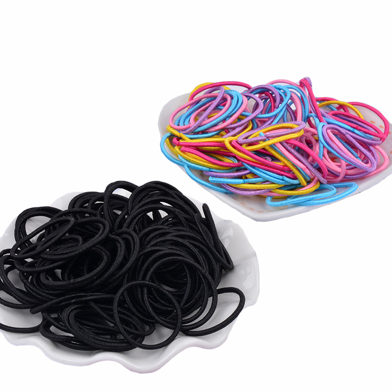 Venta caliente en línea cuerda de pelo 100 piezas banda de pelo para niños bebé color caramelo cuerda de pelo niña banda de goma accesorios para el cabello al por mayor