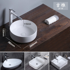 メーカーのホテルの円形の台の上でたらいの四角形の陶磁器の洗面器の三角の芸術のたらいの陶磁器の洗面器の卸売りの工事