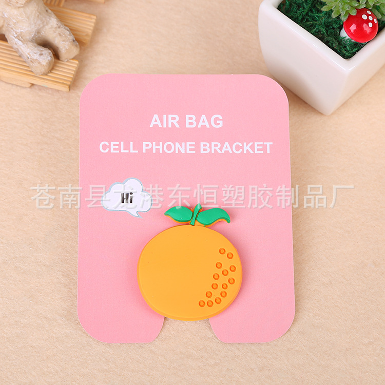 En stock al por mayor TikTok Cartoon creativo soporte de teléfono móvil puede soportar airbag soporte de teléfono móvil soporte de escritorio