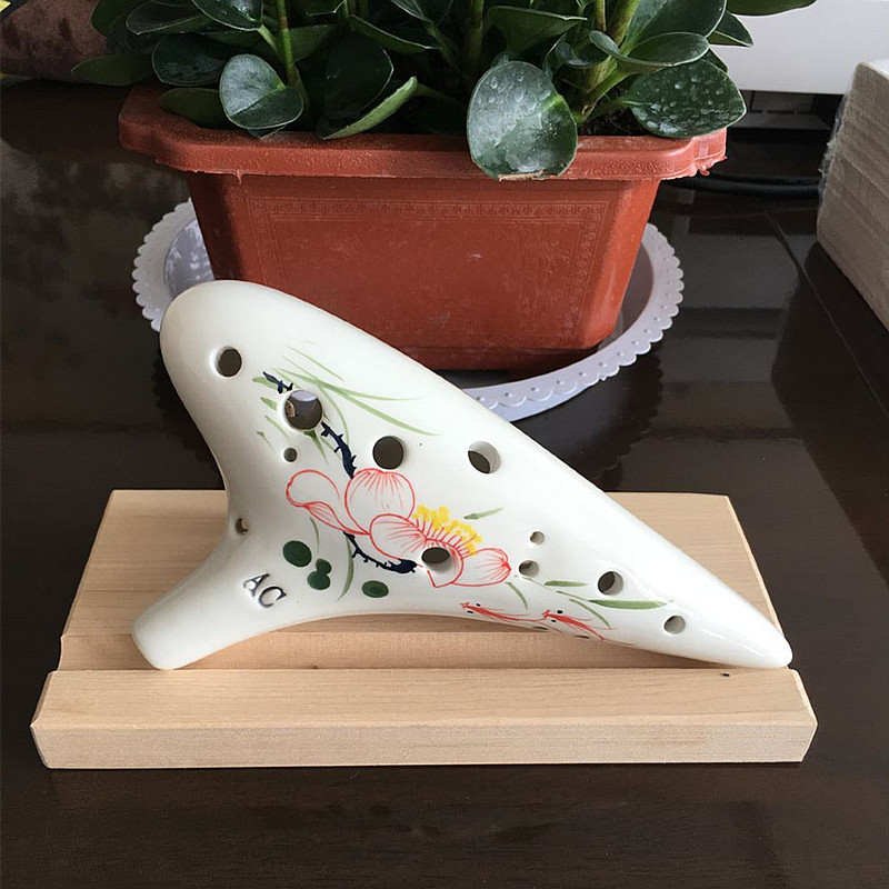 Instrumentos musicales al por mayor 12-hole Alto C Tune Ocarina adecuado para la escuela piano principiantes aprendizaje calidad es buena