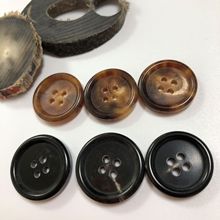 厂家直销天然真牛角扣高档西装四眼细边圆边牛角扣子毛呢大衣纽扣