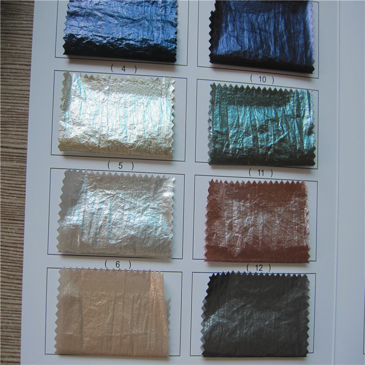 新款羽绒服烫金面料  秋冬羽绒 棉服 马曱布料现货批发