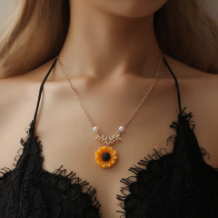 新商品の創意アクセサリーの外国貿易の人気アクセサリーの真珠の太陽の花のネックレスの女性の気質のファッションのひまわりのペンダント