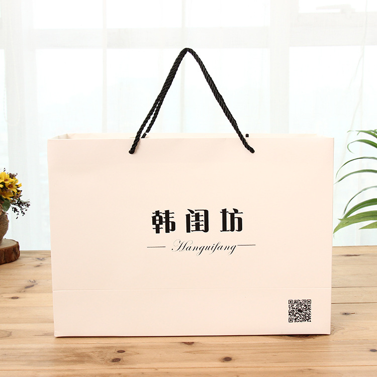 手提袋现货服装纸袋购物袋 礼品袋服装手提袋印刷LOGO图案 厂家