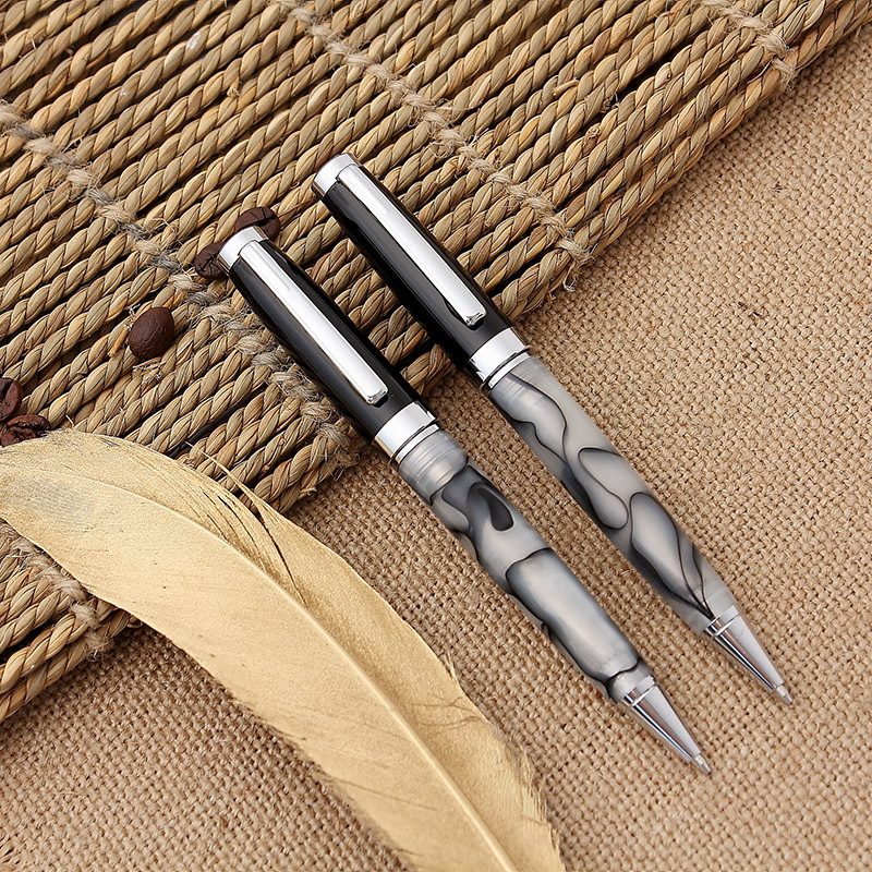 Fábrica al por mayor metal acrílico giratorio bolígrafo negocio publicidad regalo pluma impresa LOGO entrega de una sola pieza