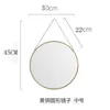 Brass round mirror