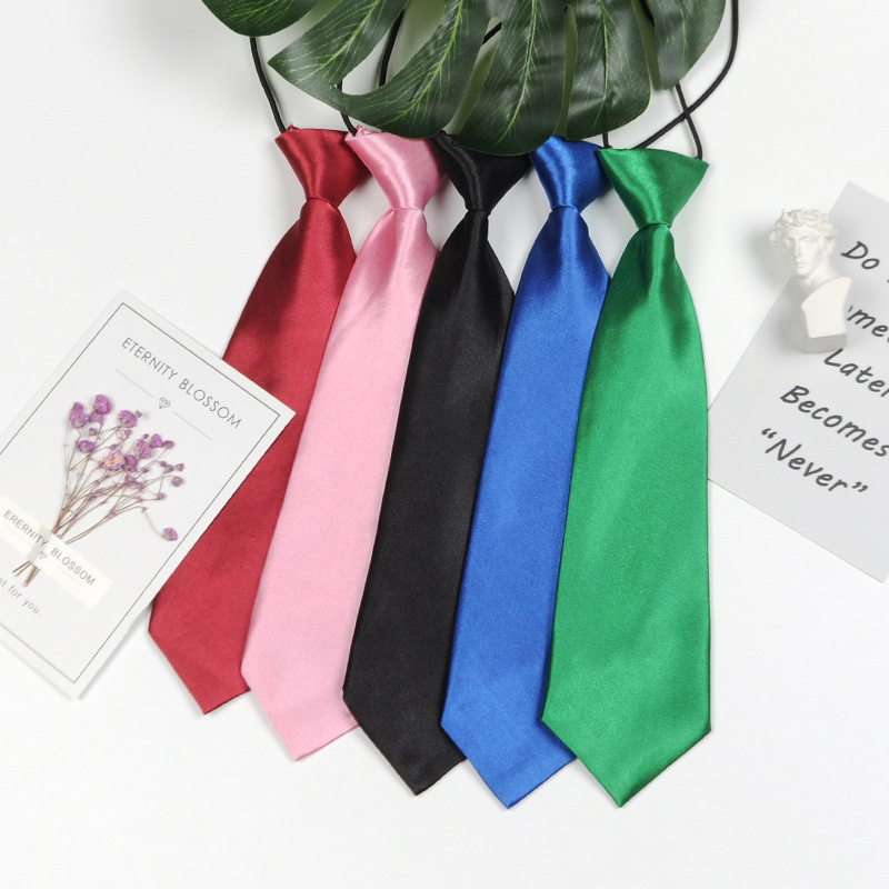 Hombres y niñas estudiantes de color sólido corbata pequeña al por mayor rendimiento del equipo de escenario negro tibetano azul spot fábrica directa