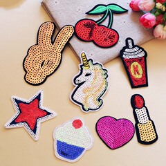 Embroidered patch with computerized embroidery, sparkling unicorn-themed fabric patch for DIY clothing decoration and embellishment.