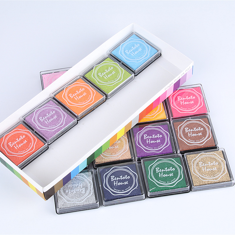 Oferta especial al por mayor de Corea papelería 4*4cm dedo pintura color inkpad DIY sello goma impresión Mesa 20 color caja