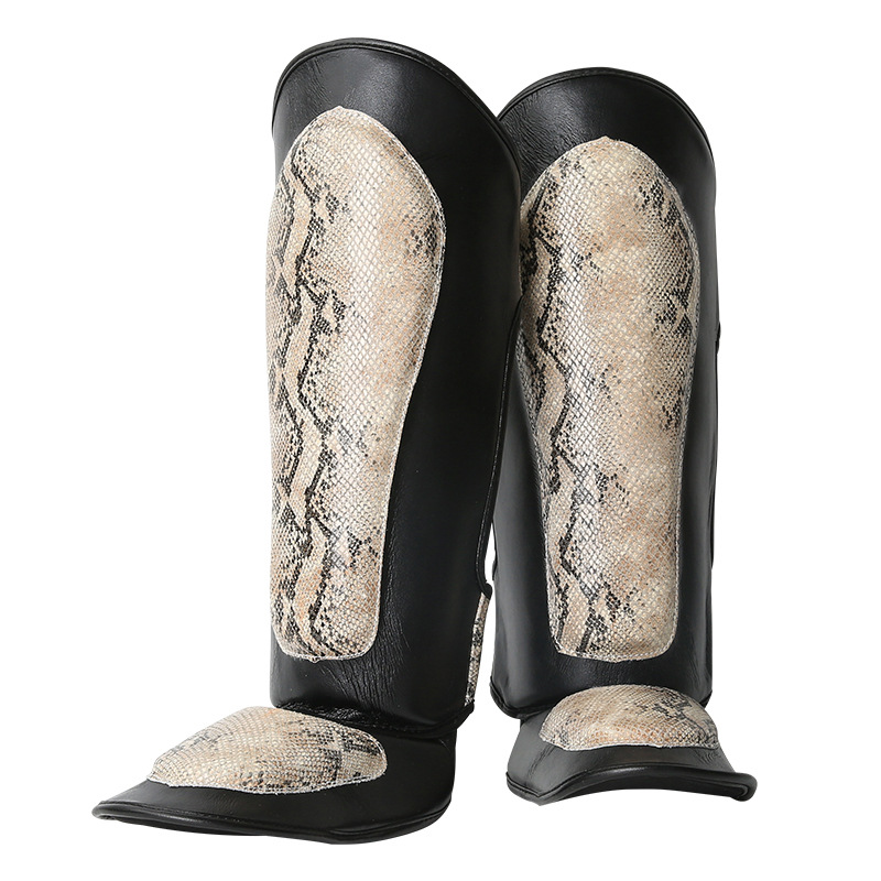 Protección de piernas de Muay Thai Sanda transfronteriza lucha contra el equipo de protección de la pantorrilla de una pieza con empeñe taekwondo libre PROTECCIÓN DE LA espinillera