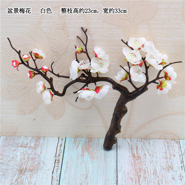 Venta al por mayor chino pastoral flor artificial del ciruelo al por mayor flor falsa pequeña flor del ciruelo rama salón flor decorativa