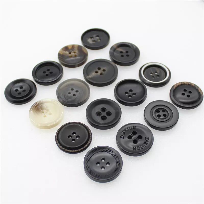 厂家大衣风衣纽扣半透明四眼两眼棒花树脂宽边细边钮扣扣子