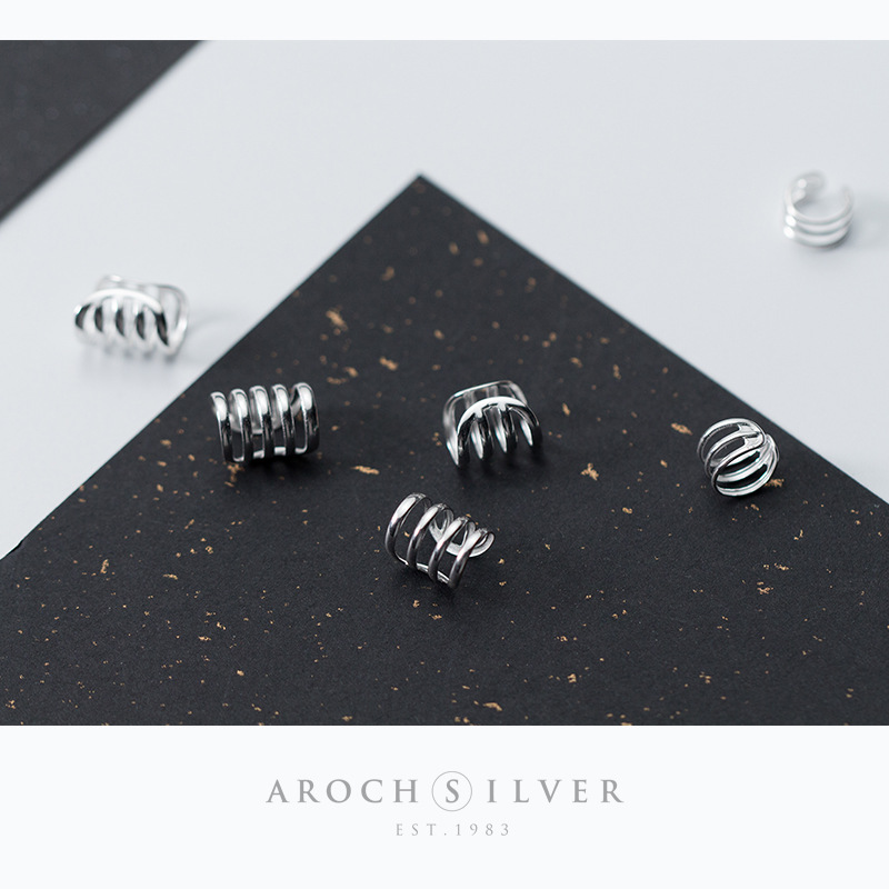 S925 plata hombre y mujer personalidad simple hueco tres o cuatro o cinco círculos sin agujeros de orejas multicapa de múltiples anillos auriculares E7273