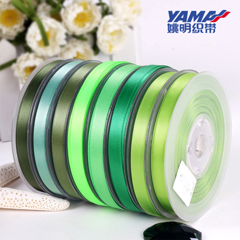 Yao Ming cinta al por mayor de doble cara cinta de satén de poliéster accesorios de bricolaje rollo completo 6mm serie verde 510-556