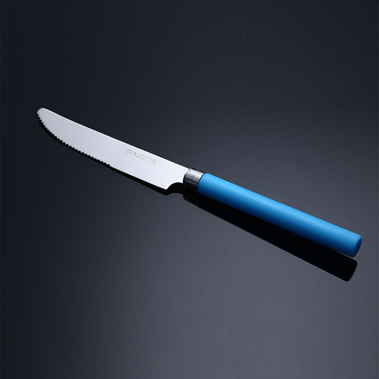 Juego de vajilla de acero inoxidable al por mayor transfronterizo bistec cuchillo tenedor comida occidental cuchillo tenedor cuchara mango redondo de plástico estudiante estilo ins