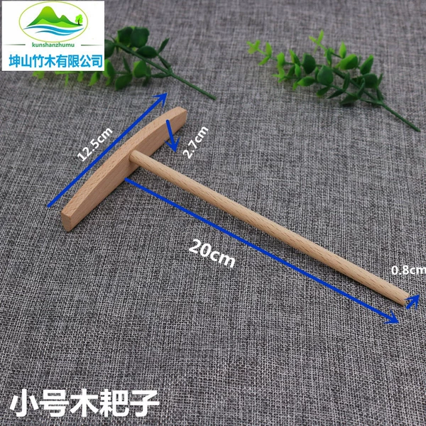 Trumpet wood rake