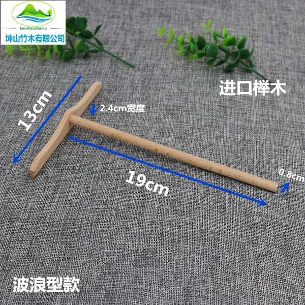 Wave -shaped T -shaped wood rake