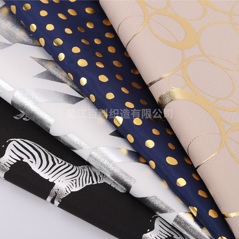 跨境旅行箱手提包里布240T春亚纺烫金涤纶布料帐篷窗帘材料现货