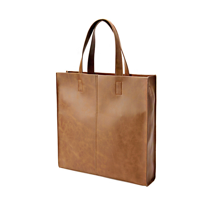 Korean version of fashionable PU leather shoulder bag, simple commuter men's and women's tote bag, square vertical crossbody large-capacity handbag_voghion.com