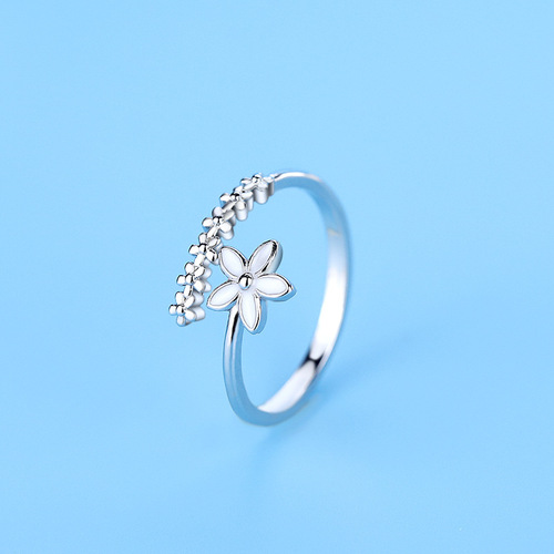 Small fresh and fashionable flower ring forest drip glaze white small flower index finger ring open female Korean version student silver jewelry