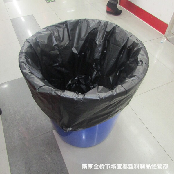 Big black plastic disposable garbage bag