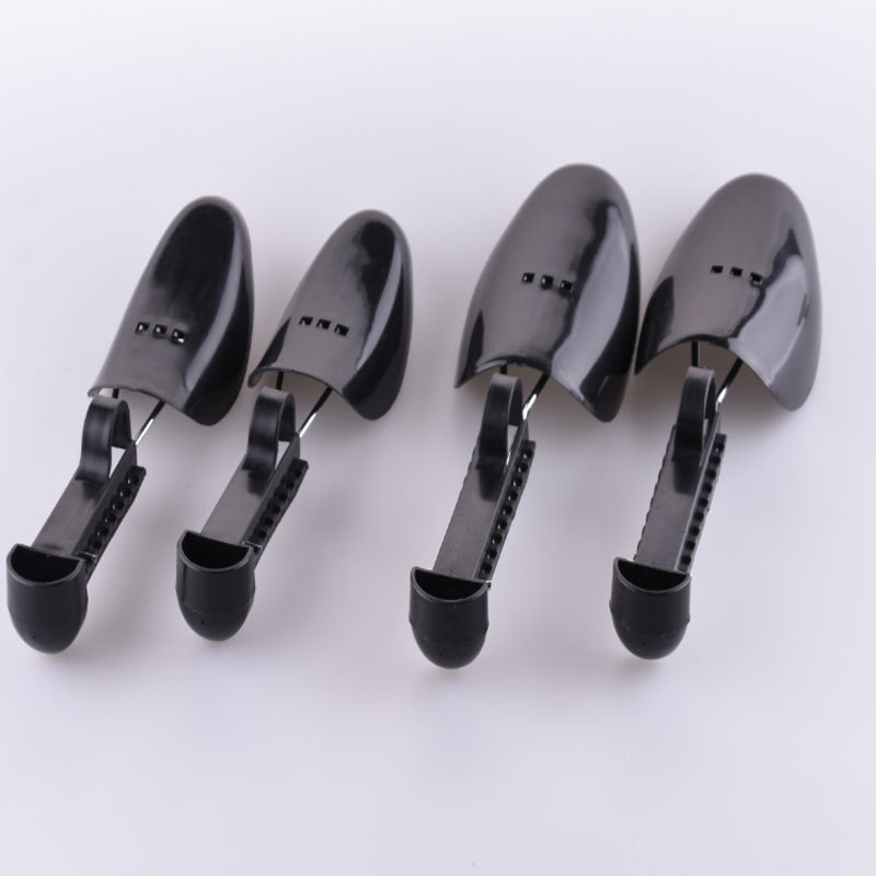 Soporte de zapato ajustable de plástico soporte de zapato de resorte de plástico soporte de zapato de plástico multicolor al por mayor